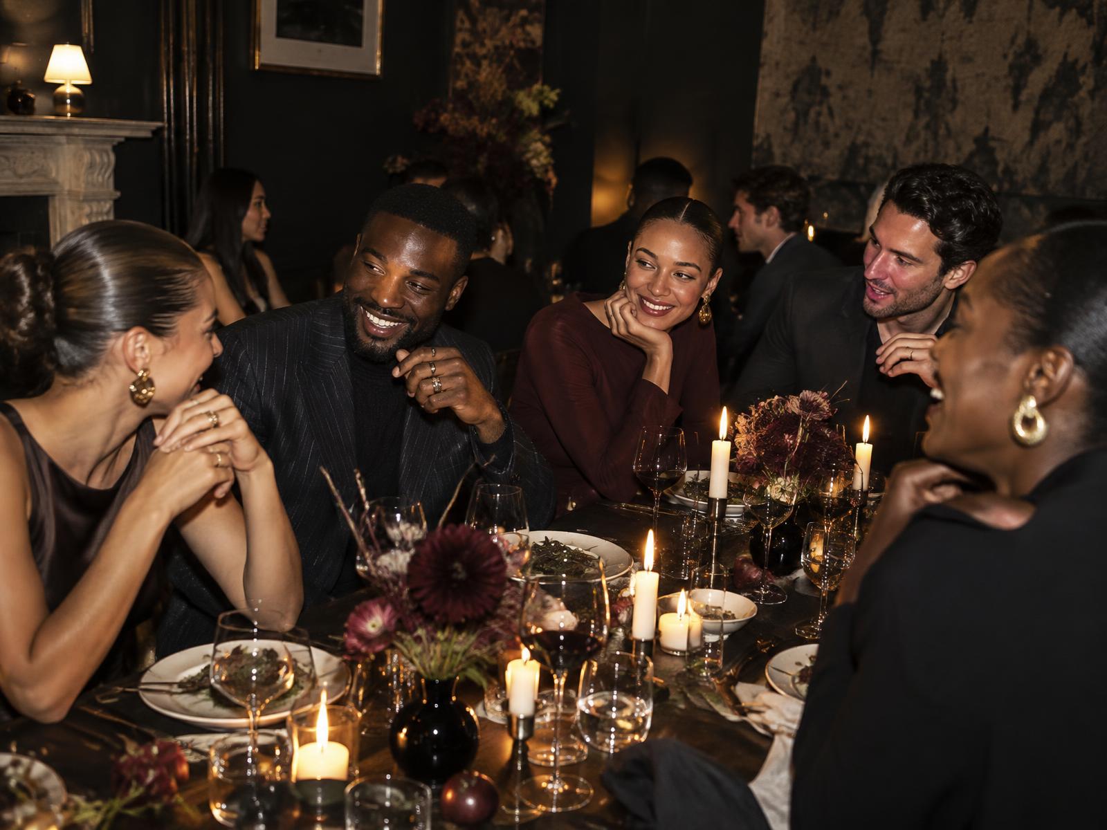 Friends at an ENVIE dinner in London
